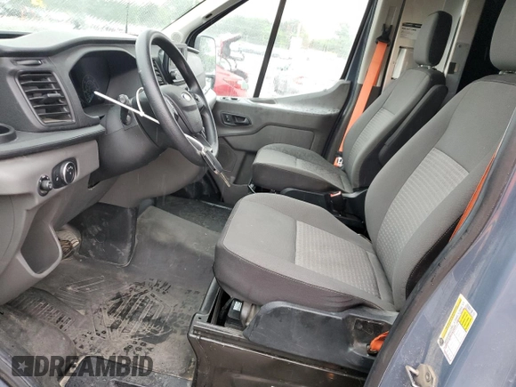 2020 Ford Transit Cargo with VIN 1FTBR3X87LKB26909, listed as a Copart auction lot 61000205 with 27,029 mi miles and Salvage title. Bid and sale history available at DreamBid. Image 7.