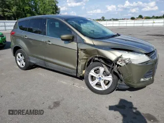 2014 Ford Escape SE z VIN 1FMCU0GX2EUA26924, wystawiony jako Copart lot #55389485 z przebiegiem 102 537 mil mil oraz Szkoda całkowita • Salvage title. Historia ofert i sprzedaży dostępna na DreamBid. Obrazek 4.
