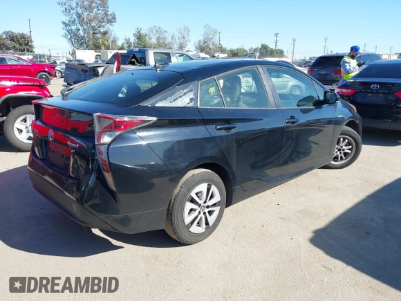 2017 Toyota Prius Two with VIN JTDKARFU1H3039405, listed as a IAAI auction lot 41834929 with 133,948 mi miles and . Bid and sale history available at DreamBid. Image 4.