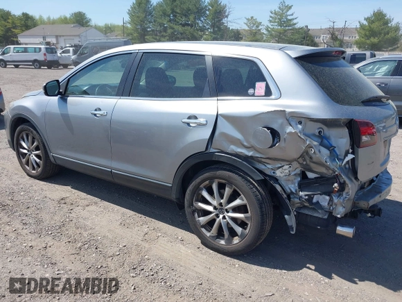 2014 Mazda CX-9 Grand Touring z VIN JM3TB3DV4E0429428, wystawiony jako IAAI lot #42094028 z przebiegiem 147 294 mil mil oraz . Historia ofert i sprzedaży dostępna na DreamBid. Obrazek 3.