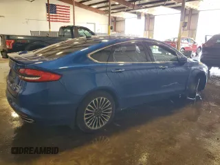2017 Ford Fusion Titanium z VIN 3FA6P0D99HR162354, wystawiony jako Copart lot #61753395 z przebiegiem 100 678 mil mil oraz Szkoda całkowita • Salvage title. Historia ofert i sprzedaży dostępna na DreamBid. Obrazek 3.
