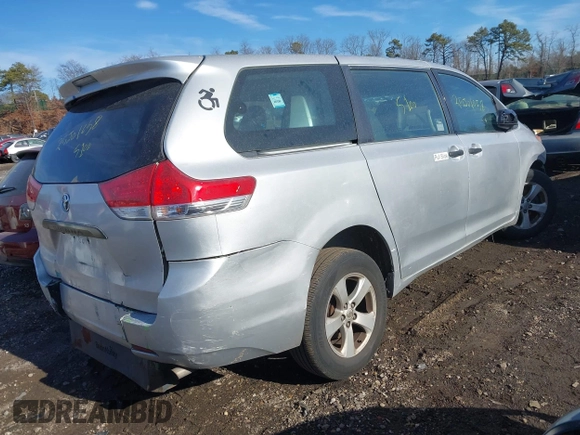 2014 Toyota Sienna L with VIN 5TDZK3DC8ES476153, listed as a IAAI auction lot 41462668 with 999,999 mi miles. Bid and sale history available at carsss.com. Image 4.
