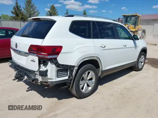 2018 Volkswagen Atlas SE with VIN 1V2KR2CAXJC586848, listed as a IAAI auction lot 42200959 with 96,336 mi miles and . Bid and sale history available at DreamBid. Image 4.