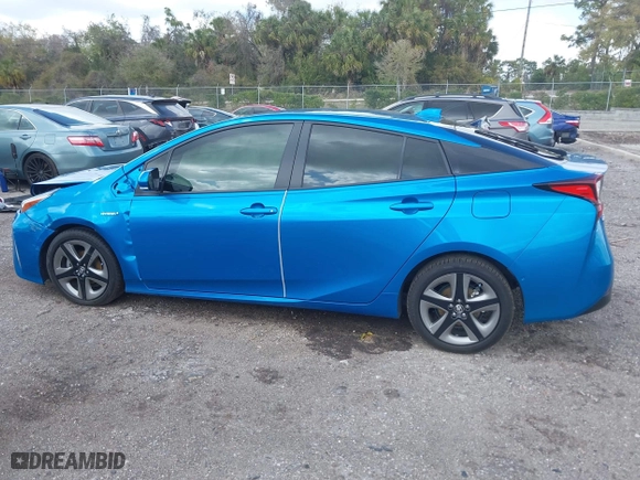 2022 Toyota Prius L Eco with VIN JTDKAMFU5N3165006, listed as a IAAI auction lot 41753470 with 33,567 mi miles. Bid and sale history available at carsss.com. Image 14.