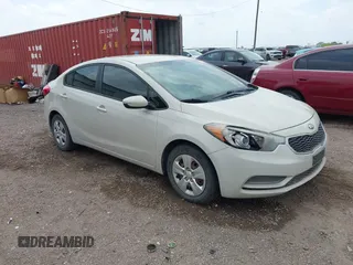 2015 Kia Forte LX with VIN KNAFK4A66F5314811, listed as a IAAI auction lot 42054640 with 123,901 mi miles. Bid and sale history available at carsss.com. Image 1.
