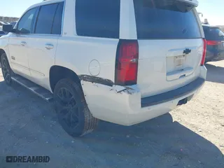 2018 Chevrolet Tahoe LT with VIN 1GNSCBKC8JR128476, listed as a IAAI auction lot 41447799 with 105,209 mi miles. Bid and sale history available at carsss.com. Image 17.