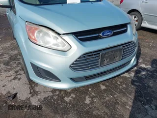 2013 Ford C-Max SE z VIN 1FADP5AU7DL500436, wystawiony jako IAAI lot #42270861 z przebiegiem 105 301 mil mil oraz . Historia ofert i sprzedaży dostępna na DreamBid. Obrazek 6.