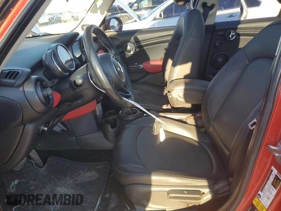 2016 MINI Hardtop 4 Door with VIN WMWXU1C59G2D09996, listed as a Copart auction lot 49085325 with 119,806 mi miles and Salvage title. Bid and sale history available at DreamBid. Image 7.