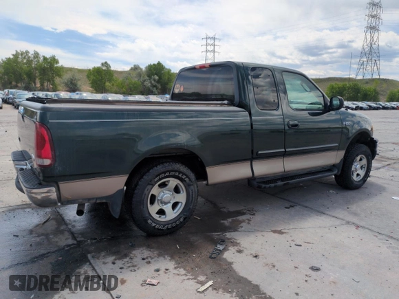 2003 Ford F-150 XL with VIN 2FTRX172X3CA58789, listed as a Copart auction lot 57986695 with 160,124 mi miles and Salvage title. Bid and sale history available at DreamBid. Image 3.