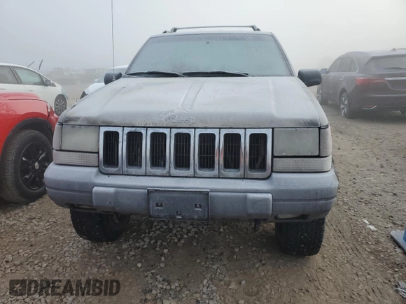 1997 Jeep Grand Cherokee Laredo with VIN 1J4GZ58Y6VC603370, listed as a Copart auction lot 82802794 with 0 mi miles and Salvage Title. Bid and sale history available at carsss.com. Image 5.