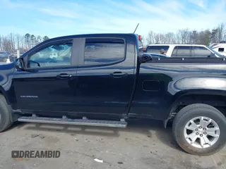 2021 Chevrolet Colorado 2WD LT with VIN 1GCGSCEN1M1111865, listed as a IAAI auction lot 41650905 with 58,389 mi miles and . Bid and sale history available at DreamBid. Image 14.