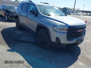 2023 GMC Acadia SLT with VIN 1GKKNML40PZ119581, listed as a IAAI auction lot 41841288 with 23,611 mi miles and . Bid and sale history available at carsss.com. Image 1.