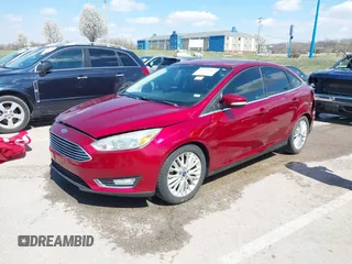 2015 Ford Focus Titanium with VIN 1FADP3J29FL230664, listed as a IAAI auction lot 41870083 with 125,578 mi miles and . Bid and sale history available at DreamBid. Image 20.