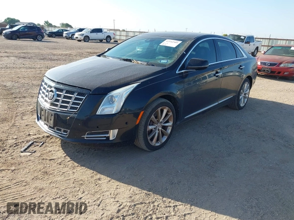 2014 Cadillac XTS Luxury with VIN 2G61M5S35E9228802, listed as a IAAI auction lot 42542501 with 106,506 mi miles and . Bid and sale history available at DreamBid. Image 2.