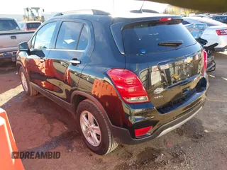2020 Chevrolet Trax LT with VIN KL7CJLSB0LB041812, listed as a IAAI auction lot 40946314 with 42,616 mi miles and . Bid and sale history available at DreamBid. Image 3.