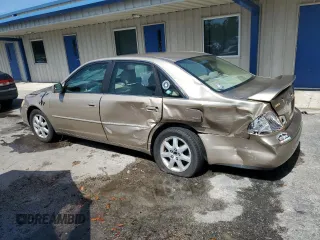 2002 Toyota Avalon XL z VIN 4T1BF28B72U261478, wystawiony jako Copart lot #57638745 z przebiegiem 146 479 mil mil oraz Szkody całkowita. Historia ofert i sprzedaży dostępna na DreamBid. Obrazek 2.
