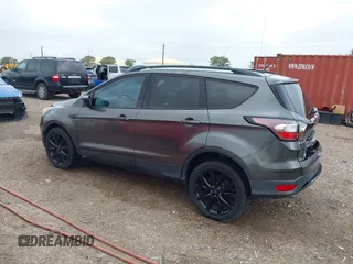2017 Ford Escape SE with VIN 1FMCU0G99HUC65571, listed as a IAAI auction lot 41923517 with 77,179 mi miles and . Bid and sale history available at DreamBid. Image 3.