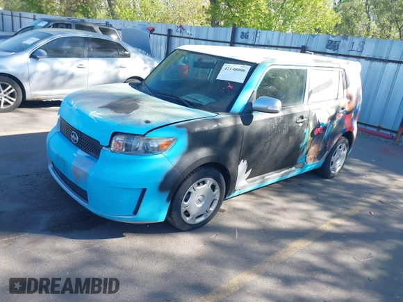 2008 Scion xB with VIN JTLKE50E381009787, listed as a IAAI auction lot 42140006 with 133,106 mi miles. Bid and sale history available at carsss.com. Image 2.