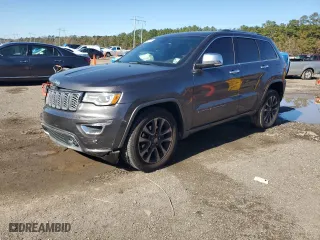 2017 Jeep Grand Cherokee Overland with VIN 1C4RJECGXHC696676, listed as a Copart auction lot 86885924 with 154,754 mi miles and Salvage Title. Bid and sale history available at carsss.com. Image 1.