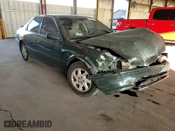2001 Toyota Camry LE z VIN JT2BF22K510303027, wystawiony jako Copart lot #85090174 z przebiegiem 253 038 mil mil oraz Szkoda całkowita • Salvage title. Historia ofert i sprzedaży dostępna na DreamBid. Obrazek 11.