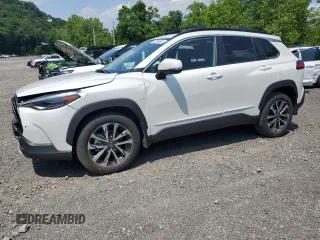 2023 Toyota Corolla Cross XLE with VIN 7MUDAABGXPV060797, listed as a Copart auction lot 62110665 with 18,293 mi miles and Salvage title. Bid and sale history available at DreamBid. Image 1.