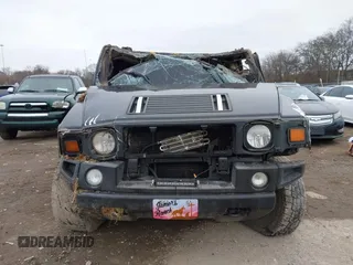 2007 Hummer H2 SUV z VIN 5GRGN23UX7H111093, wystawiony jako IAAI lot #41262675 z przebiegiem Nie podano mil oraz . Historia ofert i sprzedaży dostępna na DreamBid. Obrazek 13.