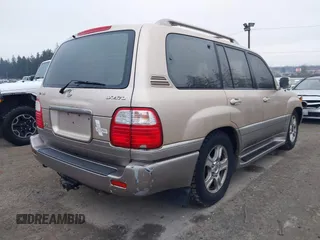 1999 Lexus LX 470 z VIN JT6HT00W4X0056023, wystawiony jako IAAI lot #41319329 z przebiegiem 206 974 mil mil oraz . Historia ofert i sprzedaży dostępna na DreamBid. Obrazek 4.