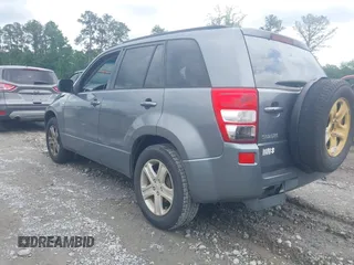 2006 Suzuki Grand Vitara Luxury z VIN JS3TE947464102818, wystawiony jako IAAI lot #42271219 z przebiegiem 192 714 mil mil oraz . Historia ofert i sprzedaży dostępna na DreamBid. Obrazek 3.
