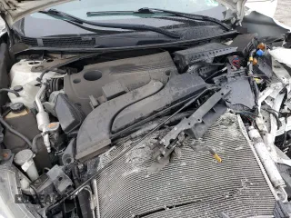 2016 Nissan Altima 2.5 S with VIN 1N4AL3AP9GC188301, listed as a Copart auction lot 52644775 with 127,485 mi miles and Salvage Title. Bid and sale history available at carsss.com. Image 13.