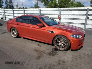 2014 BMW M5 z VIN WBSFV9C58ED097898, wystawiony jako Copart lot #86151234 z przebiegiem 60 470 mil mil oraz Tytuł czysty. Historia ofert i sprzedaży dostępna na DreamBid. Obrazek 4.