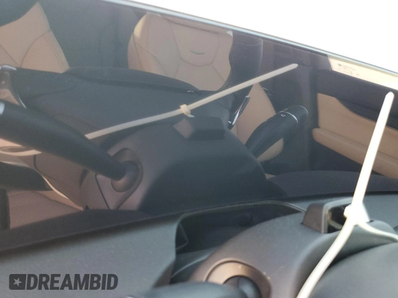2025 Cadillac CT5 Premium Luxury with VIN 1G6DN5RW9S0100675, listed as a Copart auction lot 77497624 with Not provided miles and Salvage title. Bid and sale history available at DreamBid. Image 9.