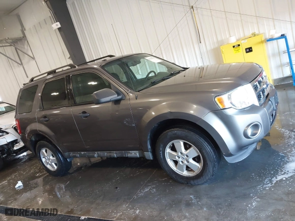 2010 Ford Escape XLT with VIN 1FMCU0D75AKA12803, listed as a IAAI auction lot 41339117 with 175,580 mi miles. Bid and sale history available at carsss.com. Image 13.