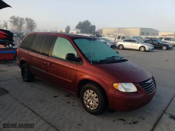 2007 Chrysler Town & Country SWB with VIN 1A4GJ45R27B113449, listed as a Copart auction lot 84227854 with 90,865 mi miles and Salvage Title. Bid and sale history available at carsss.com. Image 4.