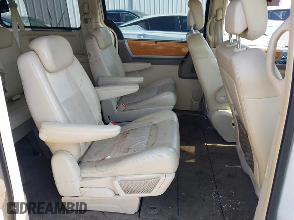 2010 Chrysler Town & Country Limited with VIN 2A4RR7DX2AR322525, listed as a IAAI auction lot 42194994 with 180,727 mi miles and . Bid and sale history available at carsss.com. Image 8.