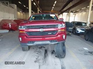 2018 Chevrolet Silverado 1500 LT with VIN 3GCUKREC0JG580317, listed as a IAAI auction lot 41868522 with 75,738 mi miles. Bid and sale history available at carsss.com. Image 12.