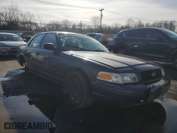 2004 Ford Police Interceptor Base w/3.27 Axle with VIN 2FAFP71W54X126756, listed as a Copart auction lot 50311705 with 135,654 mi miles and Salvage title. Bid and sale history available at DreamBid. Image 4.
