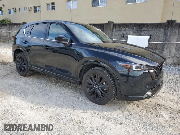 2022 Mazda CX-5 2.5 Turbo with VIN JM3KFBAY8N0619340, listed as a Copart auction lot 46217955 with 13,604 mi miles and Salvage Title. Bid and sale history available at carsss.com. Image 4.