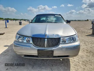 2000 Lincoln Town Car Signature with VIN 1LNHM82W9YY774120, listed as a Copart auction lot 59328725 with 137,910 mi miles and Salvage title. Bid and sale history available at DreamBid. Image 5.