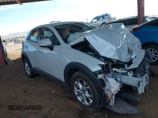 2019 Mazda CX-3 Sport with VIN JM1DKFB79K1400841, listed as a IAAI auction lot 41653084 with 77,210 mi miles. Bid and sale history available at carsss.com. Image 1.