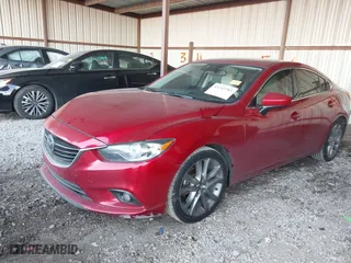 2014 Mazda Mazda6 i Grand Touring with VIN JM1GJ1W62E1141859, listed as a IAAI auction lot 41242702 with 154,117 mi miles. Bid and sale history available at carsss.com. Image 17.