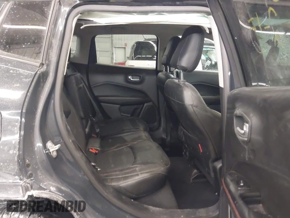 2018 Jeep Compass Trailhawk with VIN 3C4NJDDB2JT211775, listed as a IAAI auction lot 41610112 with 99,238 mi miles and . Bid and sale history available at DreamBid. Image 8.
