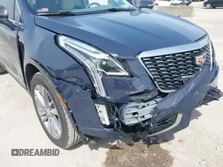 2024 Cadillac XT5 FWD Premium Luxury with VIN 1GYKNCR41RZ738779, listed as a IAAI auction lot 42266837 with 3,166 mi miles and . Bid and sale history available at DreamBid. Image 18.