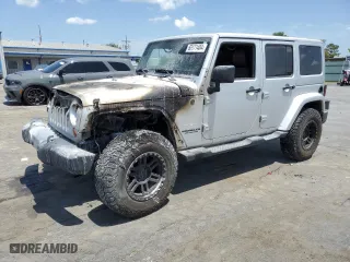 2011 Jeep Wrangler Unlimited Sahara with VIN 1J4BA5H14BL613895, listed as a Copart auction lot 65171404 with 0 mi miles and Non Repairable. Bid and sale history available at carsss.com. Image 1.