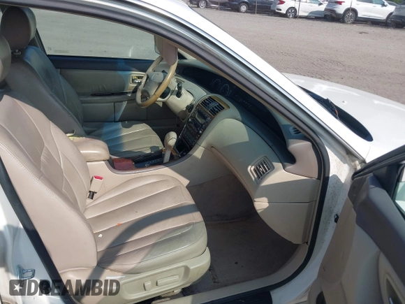 2000 Toyota Avalon XL z VIN 4T1BF28B2YU102103, wystawiony jako IAAI lot #42441529 z przebiegiem 256 568 mil mil oraz . Historia ofert i sprzedaży dostępna na DreamBid. Obrazek 5.