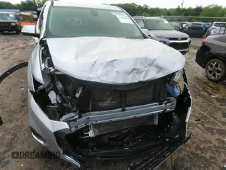 2021 Chevrolet Traverse LT with VIN 1GNERHKW6MJ157311, listed as a IAAI auction lot 42256458 with 97,635 mi miles and . Bid and sale history available at DreamBid. Image 6.