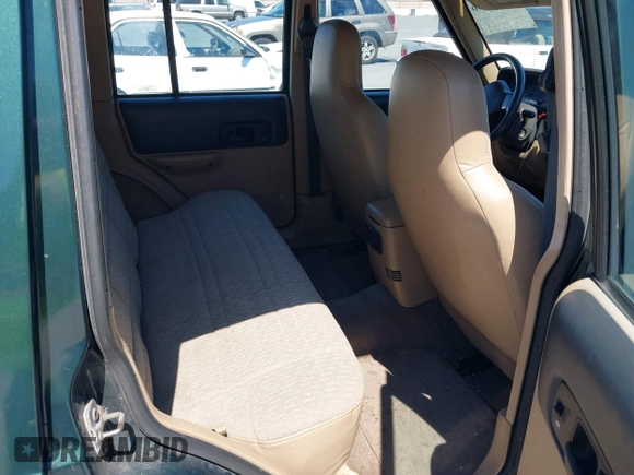 1999 Jeep Cherokee Sport with VIN 1J4FF68S0XL640066, listed as a IAAI auction lot 42768166 with 196,290 mi miles and . Bid and sale history available at DreamBid. Image 8.