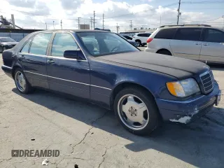 1995 Mercedes-Benz S with VIN WDBGA43E8SA217771, listed as a Copart auction lot 44983005 with 135,902 mi miles and Clean Title. Bid and sale history available at DreamBid. Image 4.