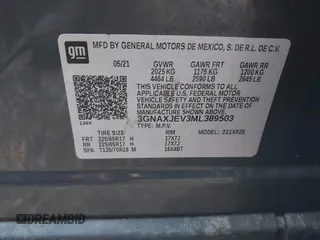 2021 Chevrolet Equinox LT with VIN 3GNAXJEV3ML389503, listed as a IAAI auction lot 41973286 with 99,878 mi miles and . Bid and sale history available at DreamBid. Image 9.