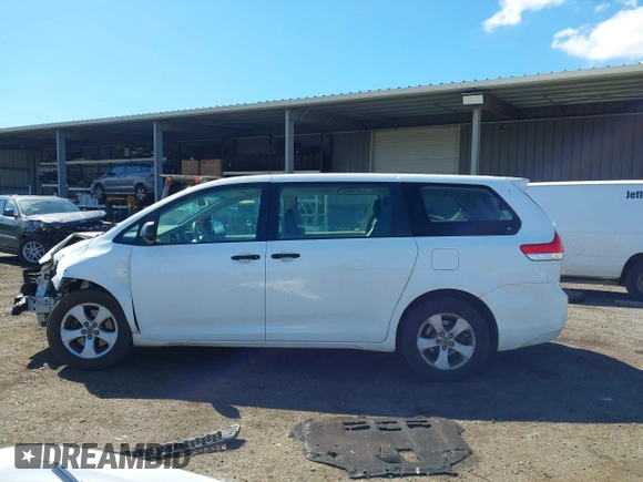 2012 Toyota Sienna with VIN 5TDZK3DC7CS203993, listed as a IAAI auction lot 41130289 with 177,059 mi miles. Bid and sale history available at carsss.com. Image 15.