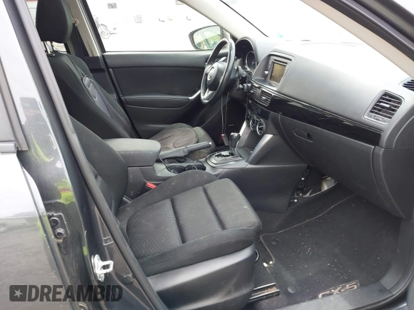 2014 Mazda CX-5 Touring with VIN JM3KE2CYXE0332517, listed as a IAAI auction lot 42109592 with 138,214 mi miles. Bid and sale history available at carsss.com. Image 5.